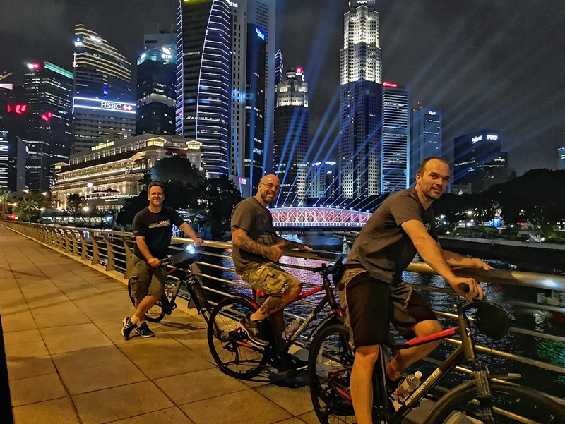 Night Bicycle Tour passes by Fullerton Hotel Singapore