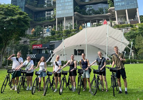 Bike tour guests visiting Speaker's Corner in Singapore