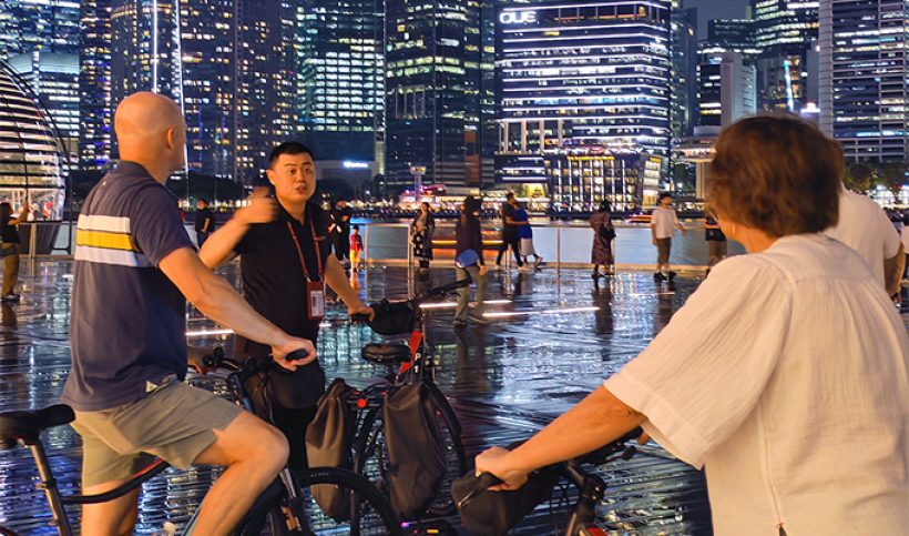 Marina Bay at night — best experienced by bicycle with a local guide