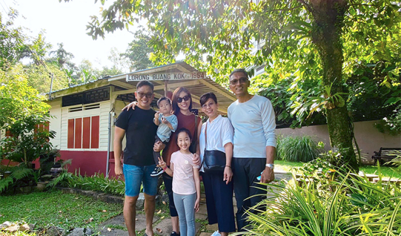 a-family-visiting-the-kampong-on-the-heritage-trail