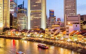 Singapore River at dusk — Boat Quay glittering in the evening light