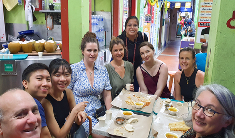 tourists-enjoying-indian-dishes-indian-food-in-singapore